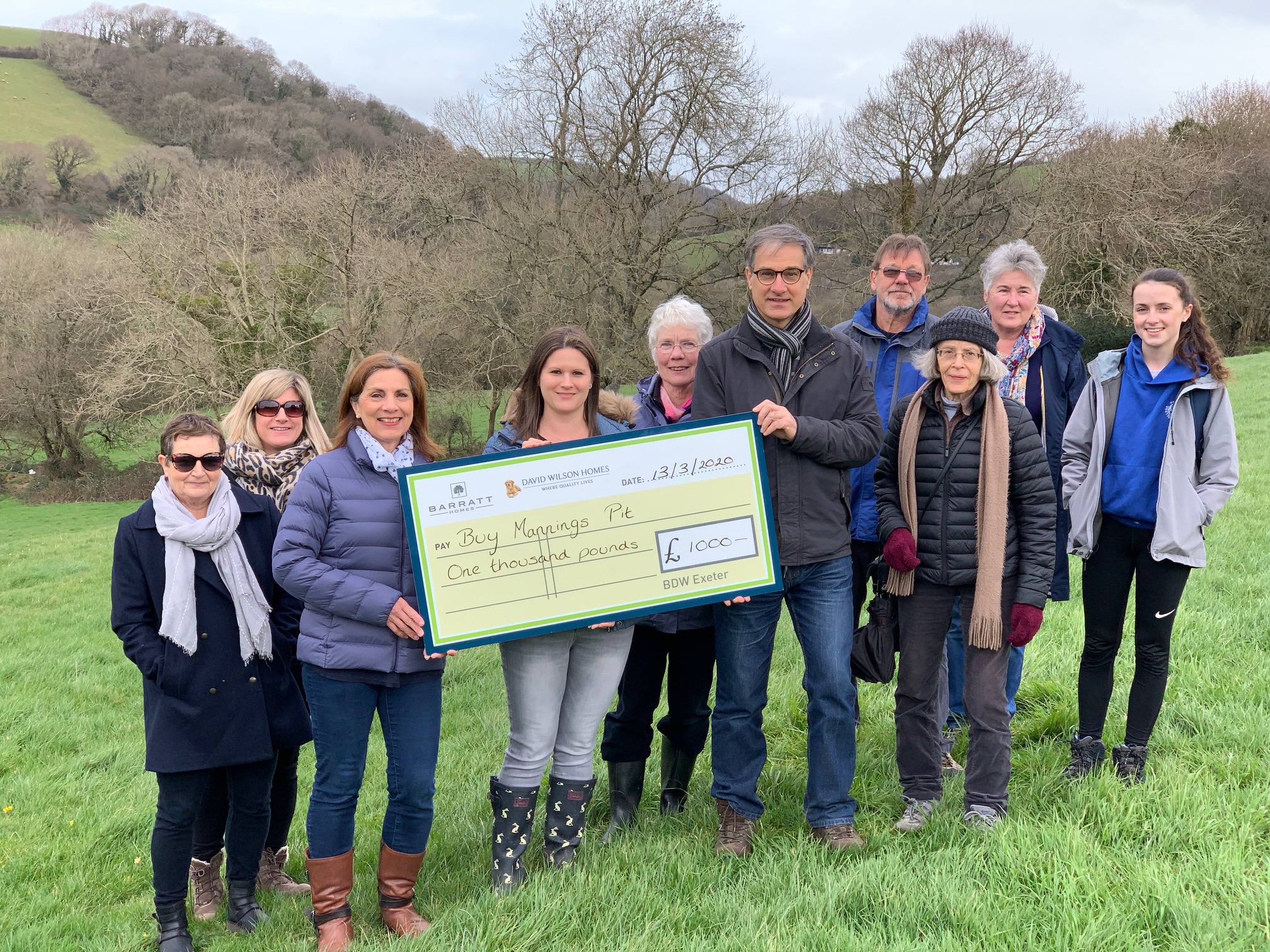 presentation of cheque from Barratt
                                David Wilson Homes in Manning's Pit