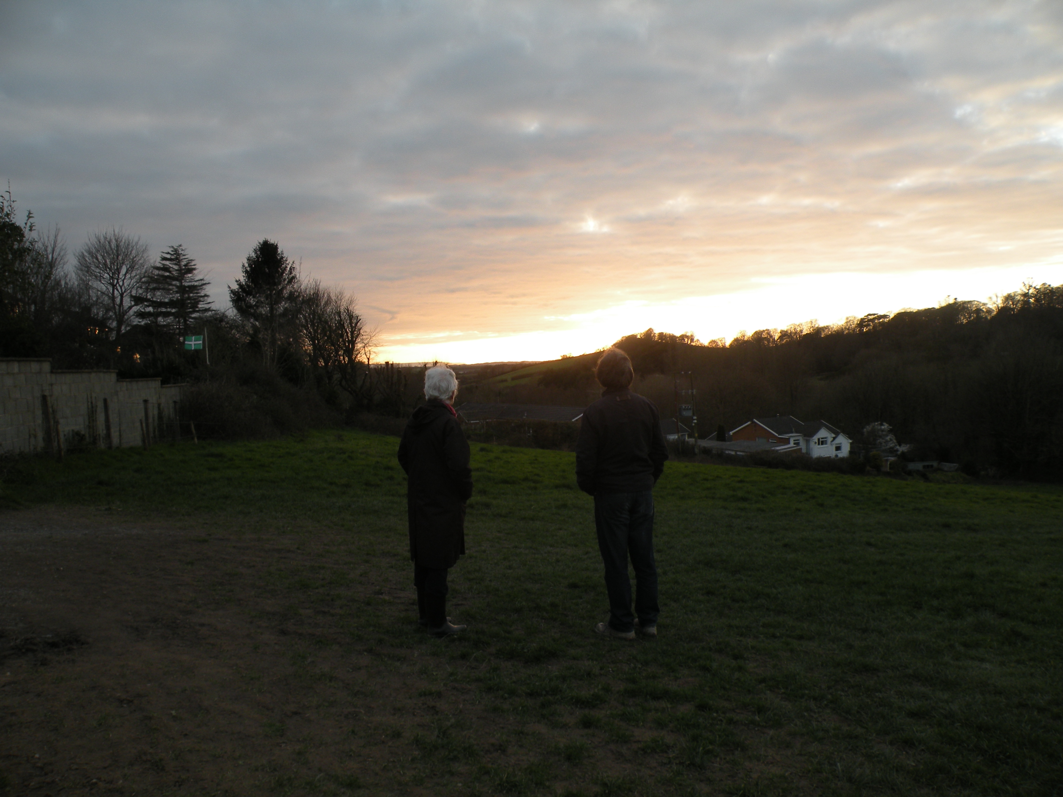 Tim and Kate watch the sun setting