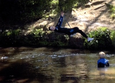 children playing in stream